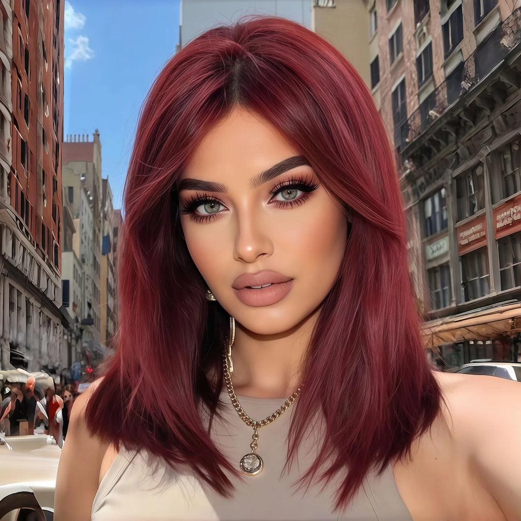 Stylish wine-red layered wig with bangs, suitable for women. Soft and easy to manage, this wine-red synthetic wig